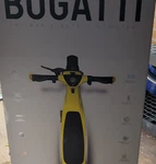 Bugatti 10" Max Kick Electric Scooter Yellow/black Self Repair Tires Suspension. Fixed Price $620.00.
