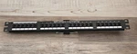 Panduit VP24382TV25Y Port Voice Patch Panel 1-24XRJ-45 1XRJ-21. Fixed Price $199.00.