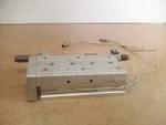 Smc MXS20-75B Guided Cylinder W/(2) D-M9PSAPC Magnetic Switches. Fixed Price $64.99.